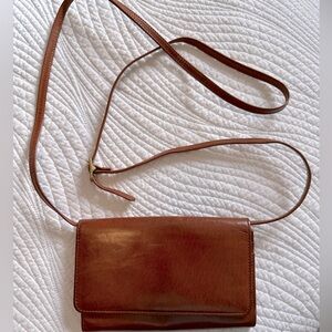 Authentic Coach wallet with strap brown leather